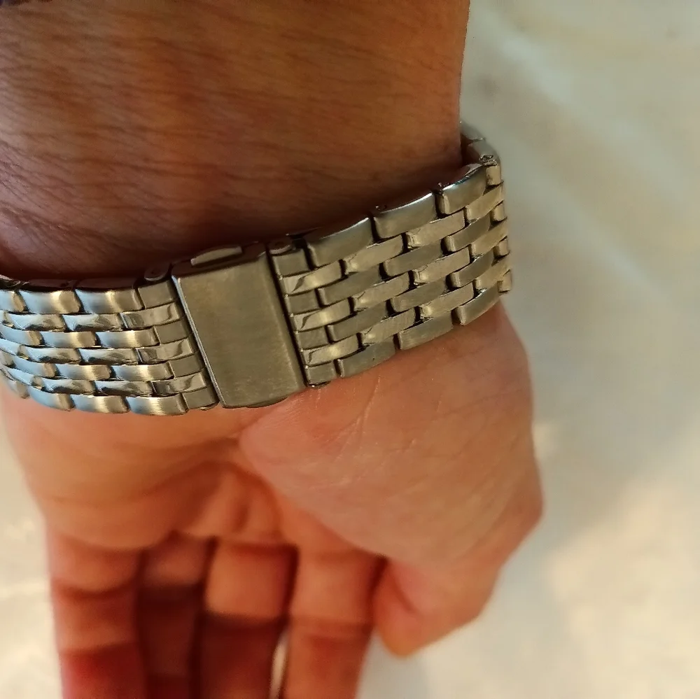Armitron Unisex watch raised crystal dome face metal silver tone band